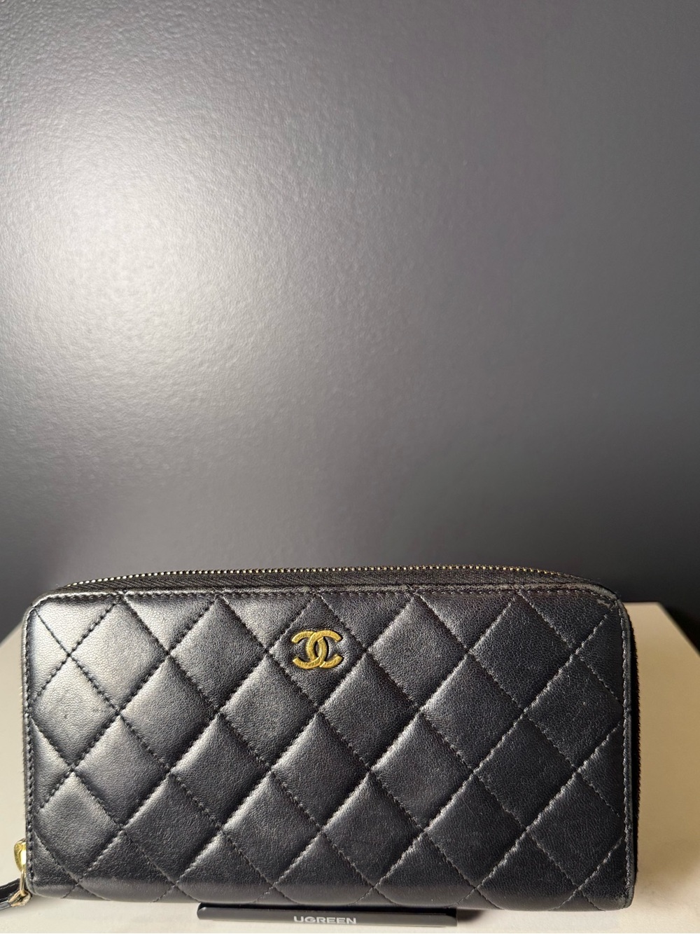 CHANEL Black Quilted Leather Zip-Around Wallet with Gold CC
